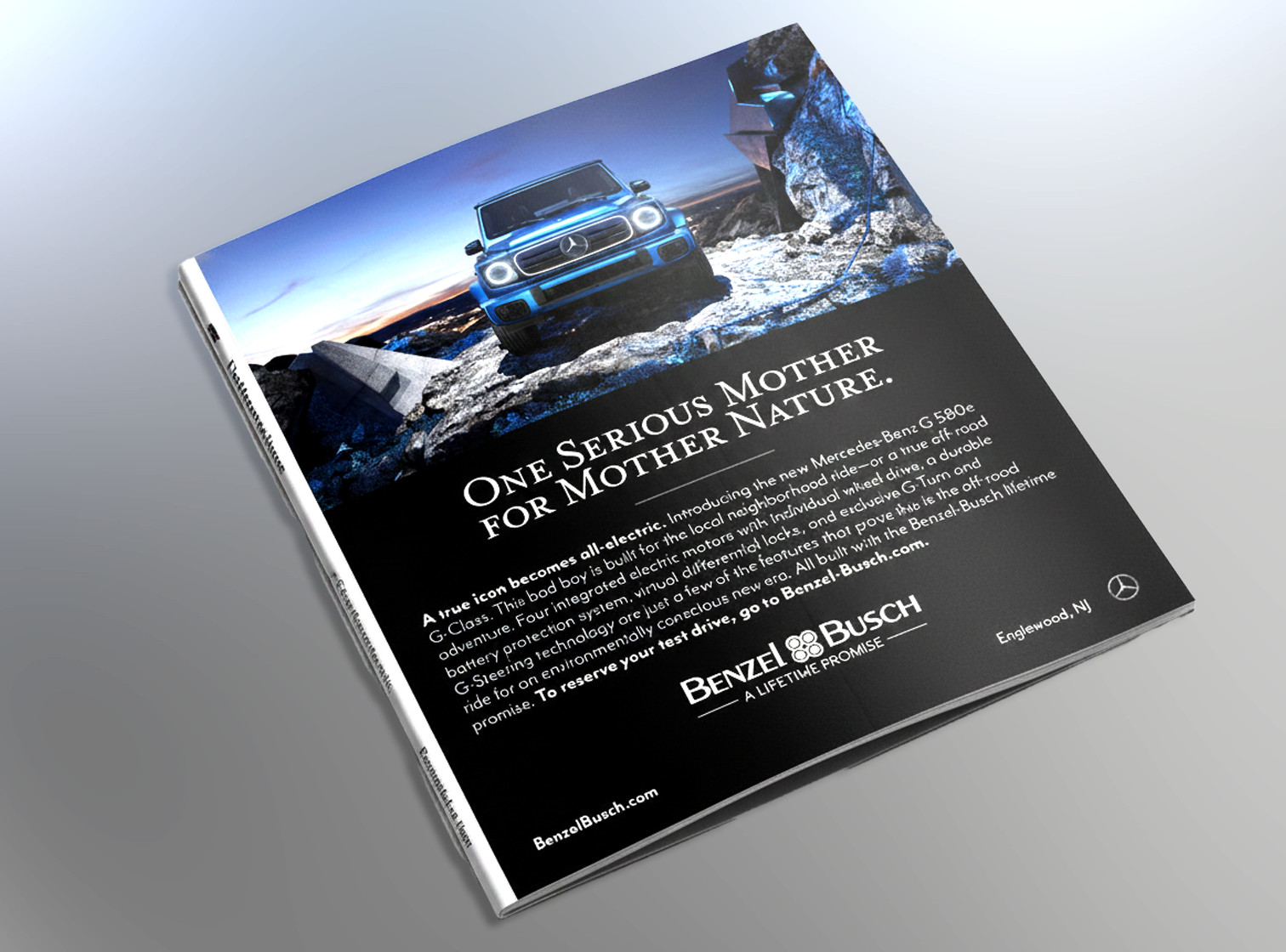Mercedes-Benz G-Wagon facing forward in a mountain landscape and reads 'One Serious Mother for Mother Nature.'