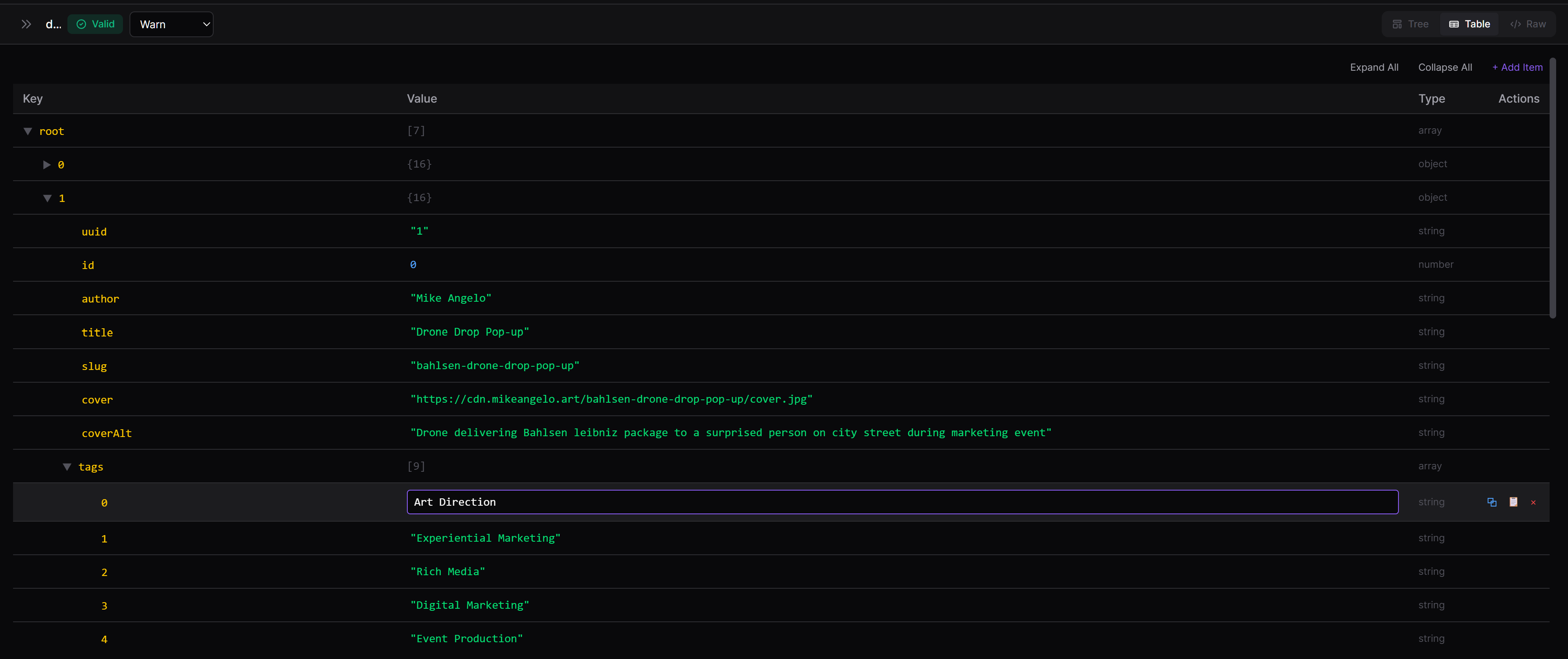 R2D2 table view of portfolio JSON with key, value, type, and action columns and an Art Direction tag being edited inline